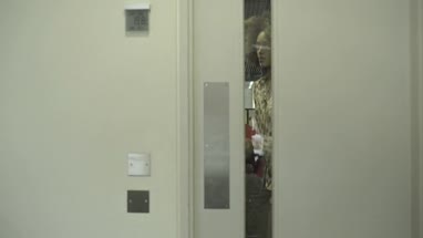 Man and woman entering in conference room and joining the meeting