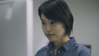 Woman working on computer in office