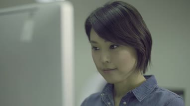 Woman working on computer in office