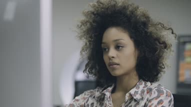 Woman working on computer in office