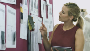 Fashion designer at work in studio