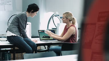 Team woman designers looking at 3D printed object