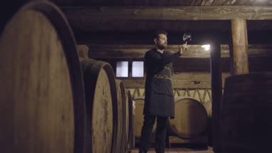 Farmer checking on wine