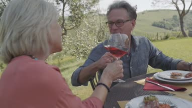 Senior couple eating alfresco