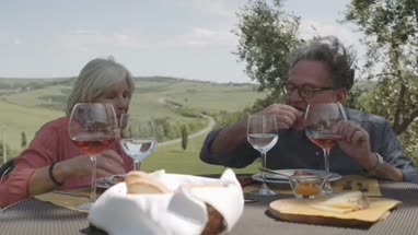 Senior couple eating alfresco