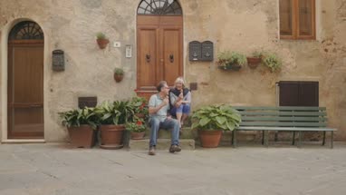 Senior couple enjoying icecream on holiday