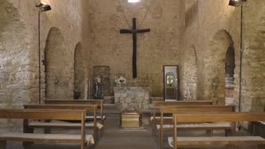 Coffin in empty church