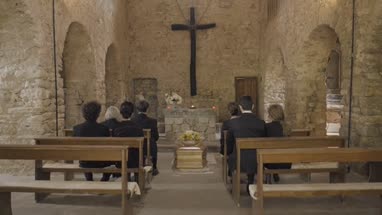 Mourners at funeral service in church