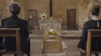 Mourners at funeral service in church