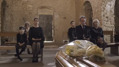 Mourners at funeral service in church