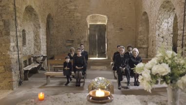 Mourners at funeral service in church