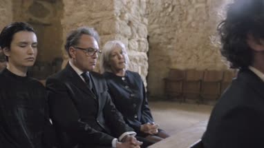 Mother with child at a funeral