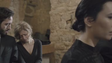 Family Mourning at funeral service in church