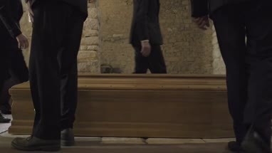 Pallbearers leaving Church with coffin