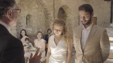 Priest pronouncing couple married