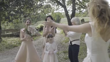 Bride throwing bouquet