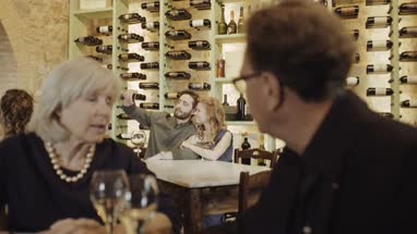 Couple taking selfie in a wine bar