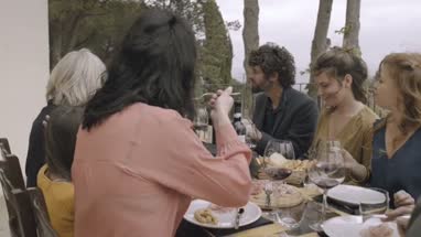 Family dining outdoors