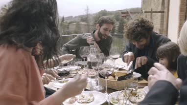 Family dining outdoors