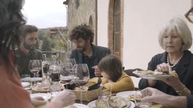 Family dining outdoors