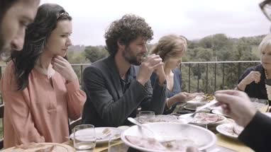 Family dining outdoors