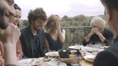 Family dining outdoors