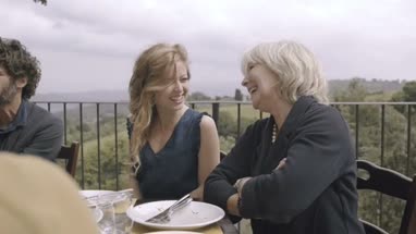 Senior mother with daughter at family meal