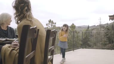 Granddaughter doing cartwheels at Family gathering