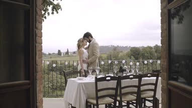 Bride and Groom kissing at wedding party
