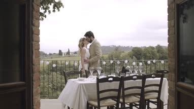 Bride and Groom kissing at wedding party