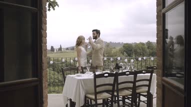 Bride and Groom kissing at wedding party