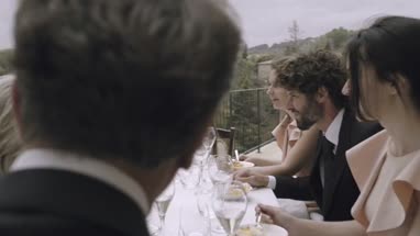 Family eating wedding cake 