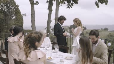 Best Man giving gift to Bride