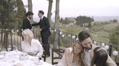 Father and Son talking at Wedding