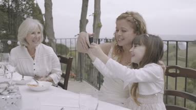 Bride and bridesmaid posing for photo