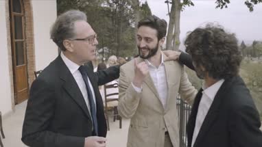 Family congratulating Groom on marriage