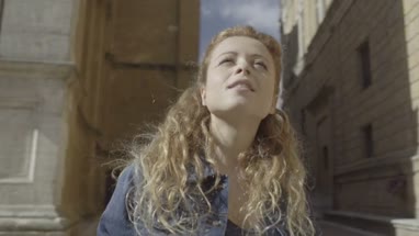 Young Adult looking at tourist landmark