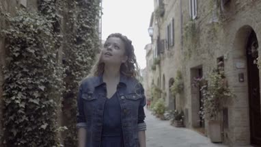 Solo traveller walking through street