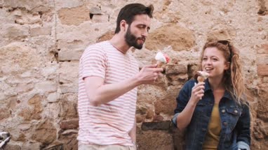 Couple eating ice cream on holiday