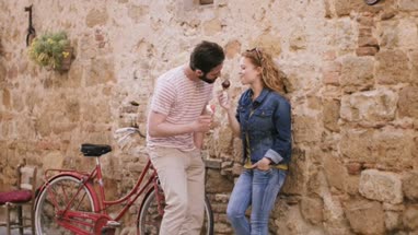 Couple eating ice cream on holiday