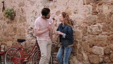 Couple eating ice cream on holiday
