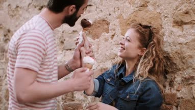 Couple eating ice cream on holiday