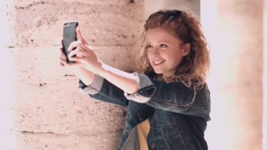 Solo traveller taking photo on vacation