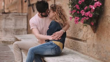 Young couple having holiday romance