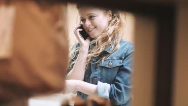 Young adult female window shopping