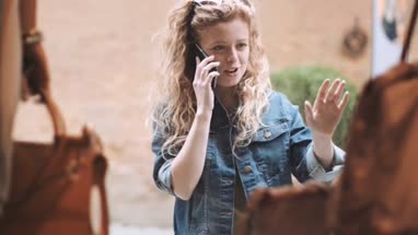 Young adult female window shopping
