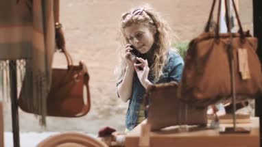 Young adult female window shopping