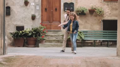 Young tourists using camera on vacation