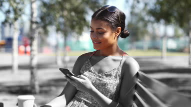 Young female in park enjoying summer