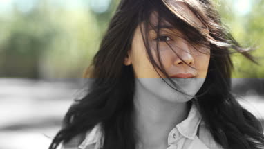 Young female with wind in hair